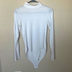 White long sleeve turtle neck body suit